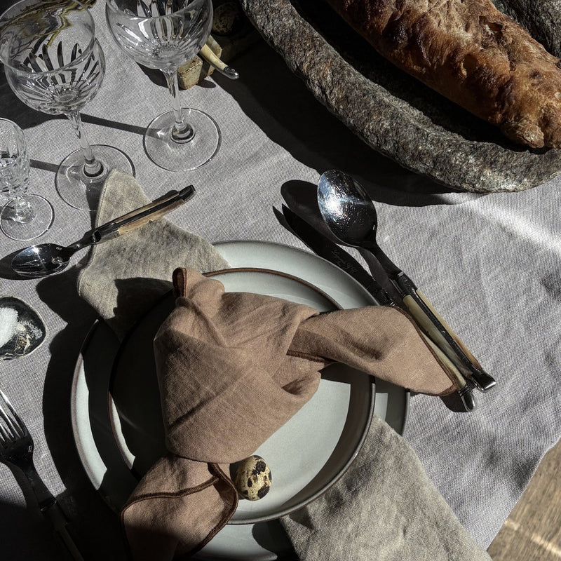 TAMEKO easter table with merrow napkin in ochre and Lee tablecloth in light grey
