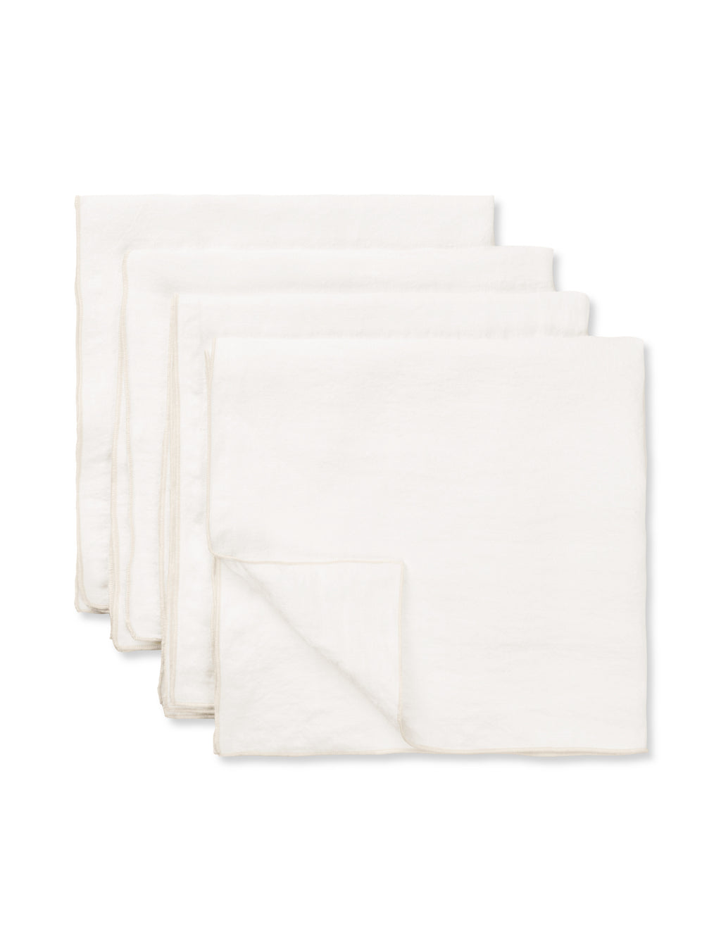 Set of 4 white Merrow napkins neatly stacked, TAMEKO table linen, minimalist design