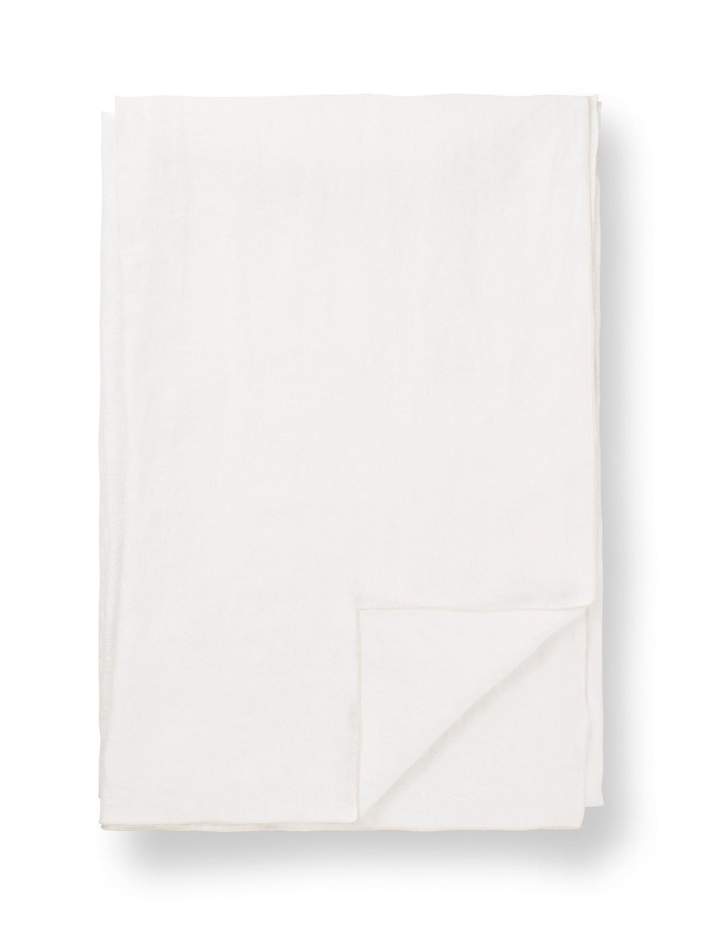 TAMEKO white merrow edge tablecloth, minimalist natural fabric, neatly folded