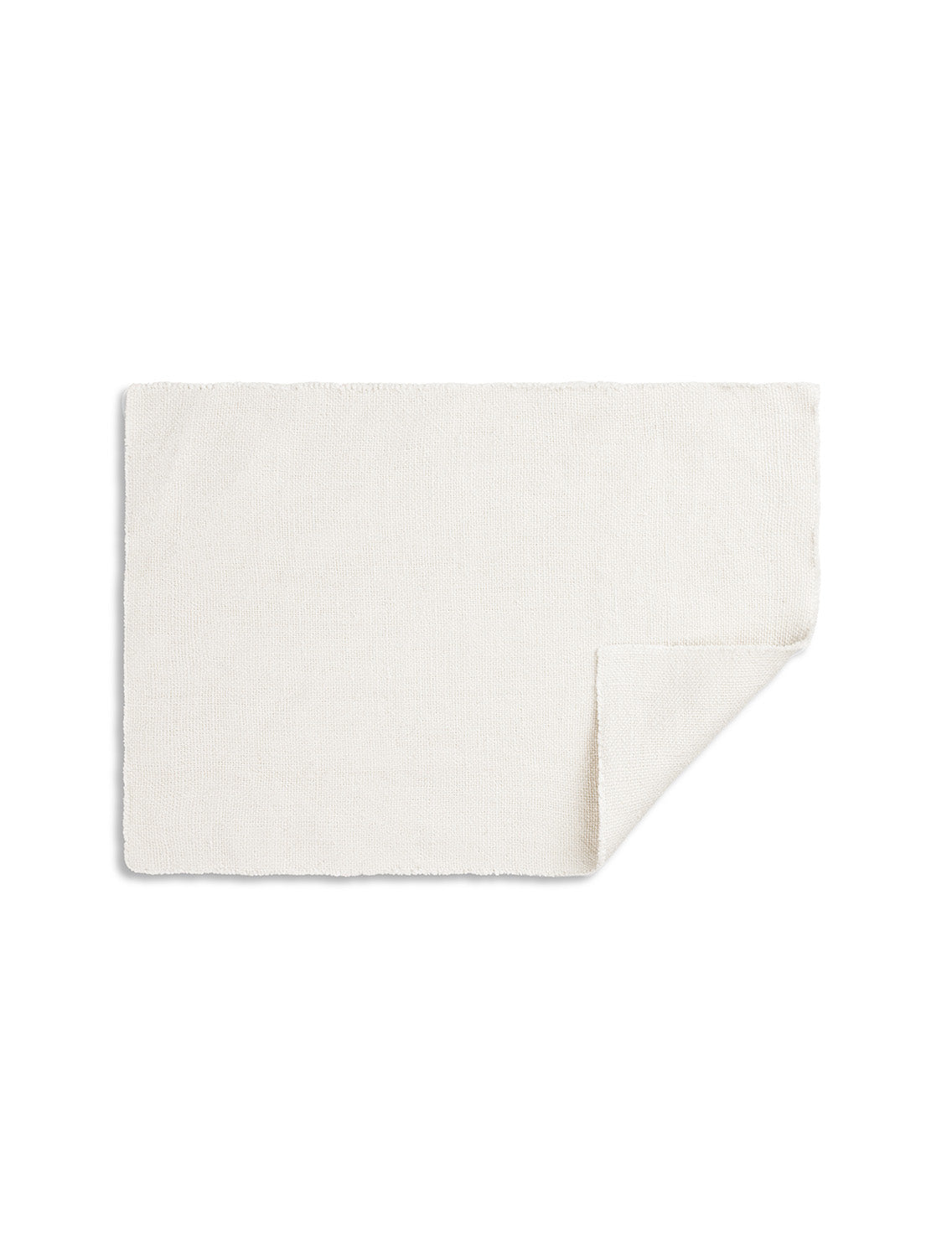 TAMEKO white Rue placemat with a natural texture, folded corner, tabletop linen